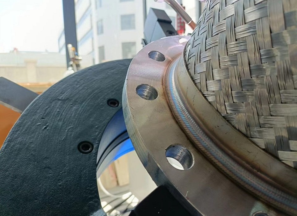 Automated Welding on Metal Hose Attachment