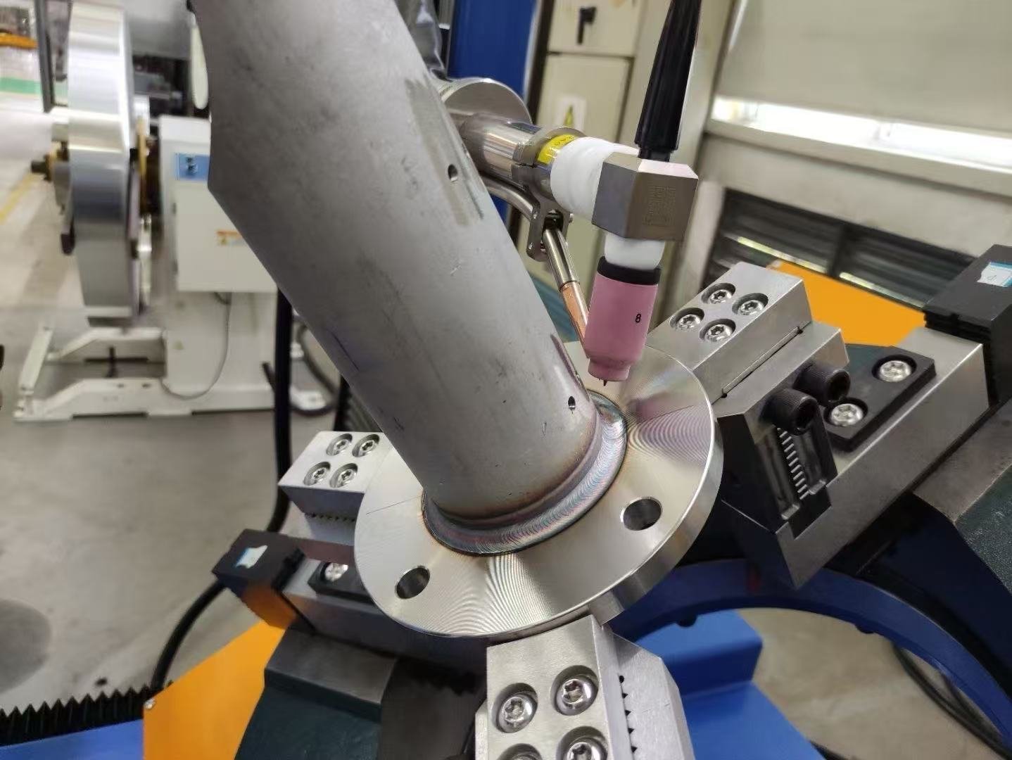 Automated pipe to flange welding sample