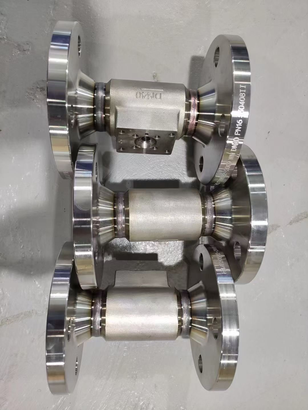 Automated welding of flow meter sample