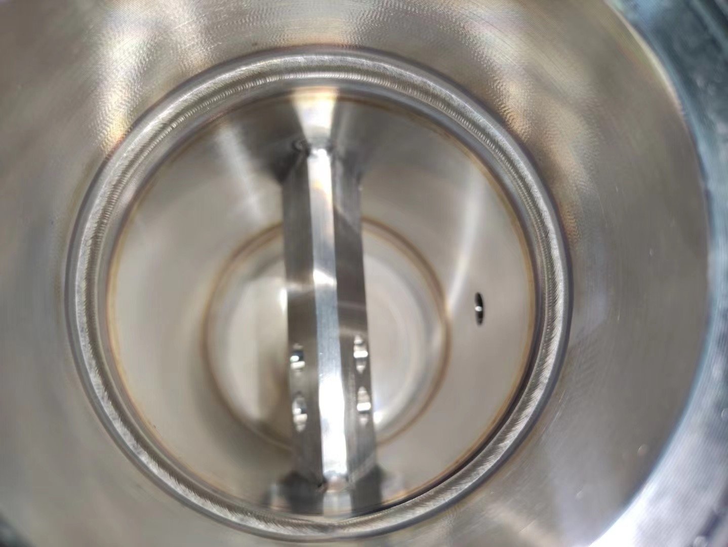 Automated welding quality sample for flow meter production