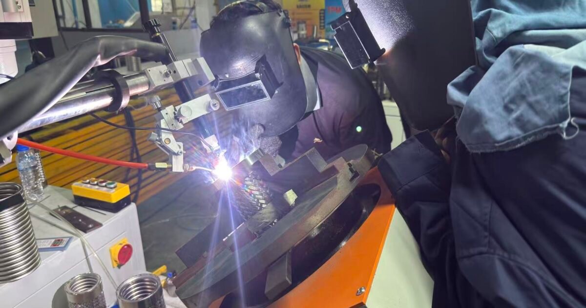 Automatic TIG welding of a braided corrugated stainless steel hose fitting for liquid cooling hose production