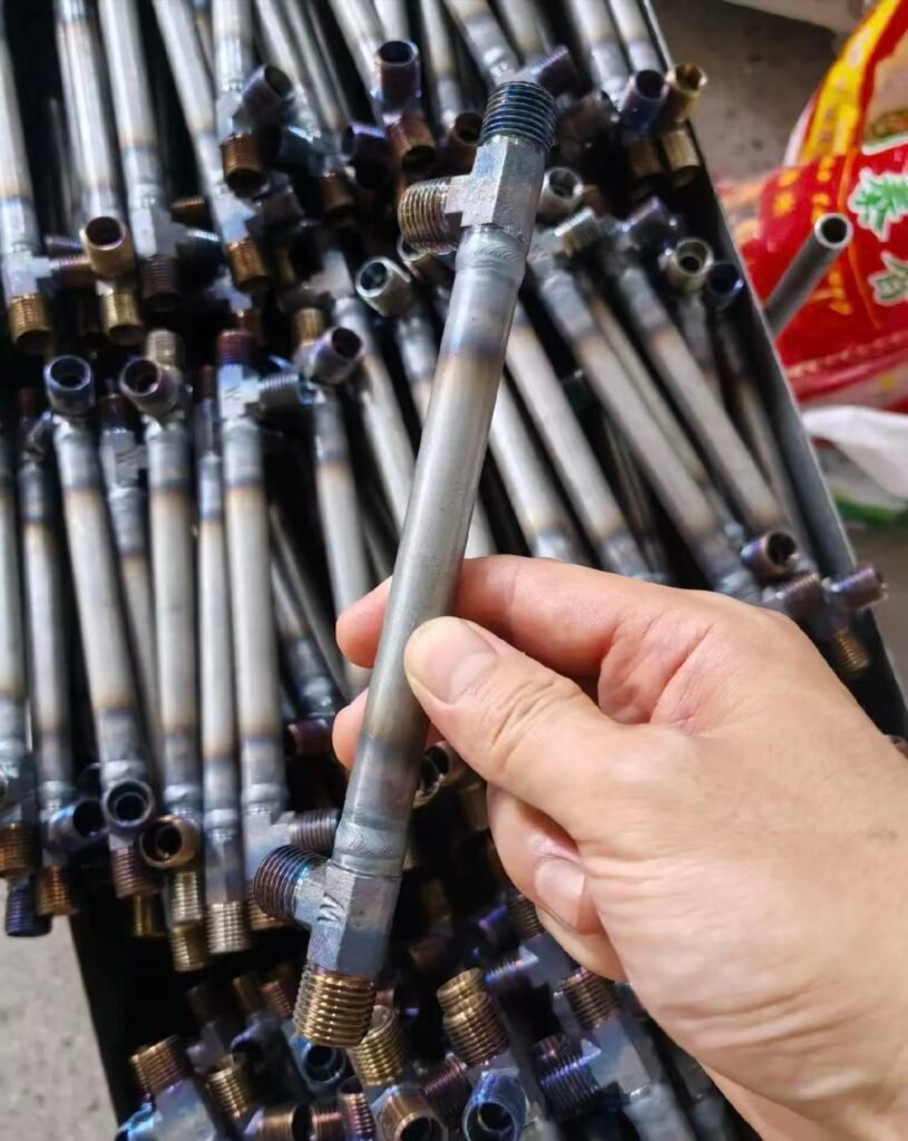 Bent hydraulic tubes with welded flanges