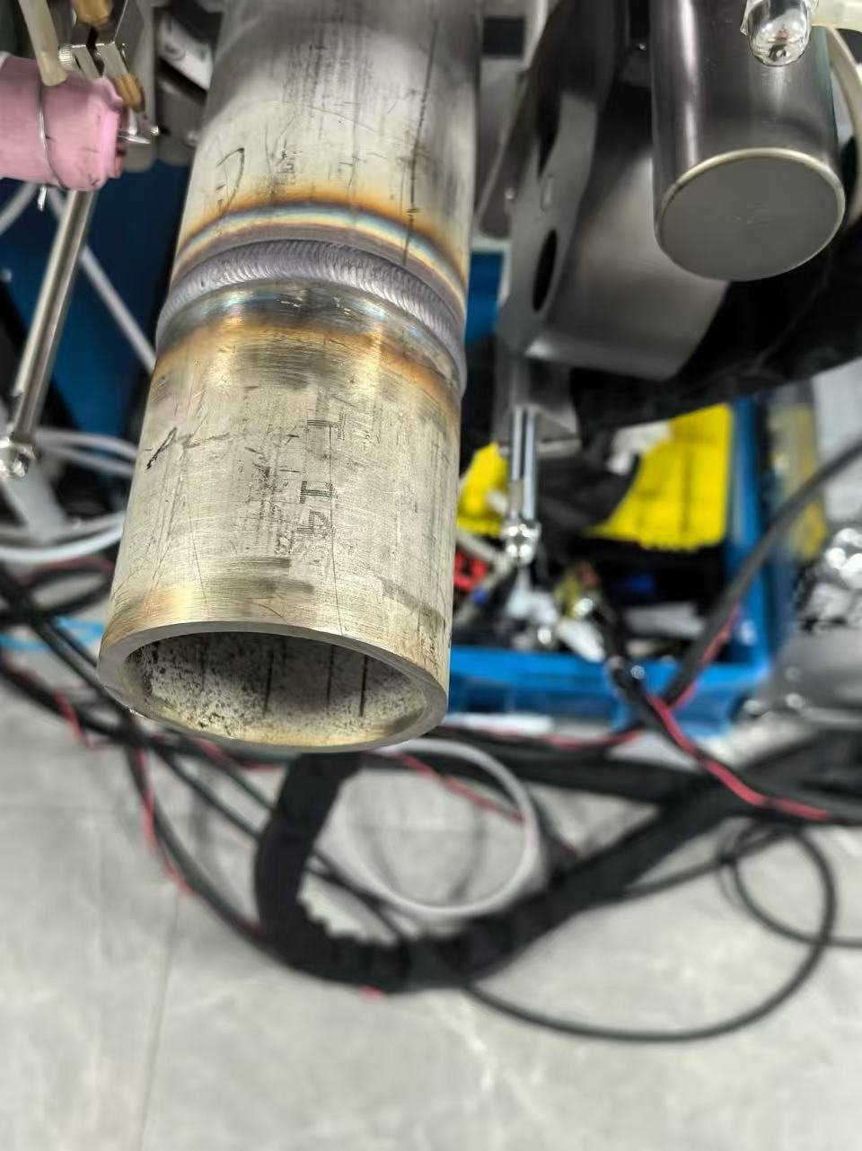 Open orbital TIG welded butt joint on a thick-wall pipe